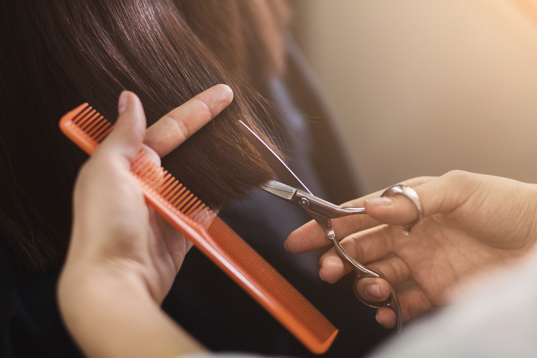 Woman getting her hair washed at a salon